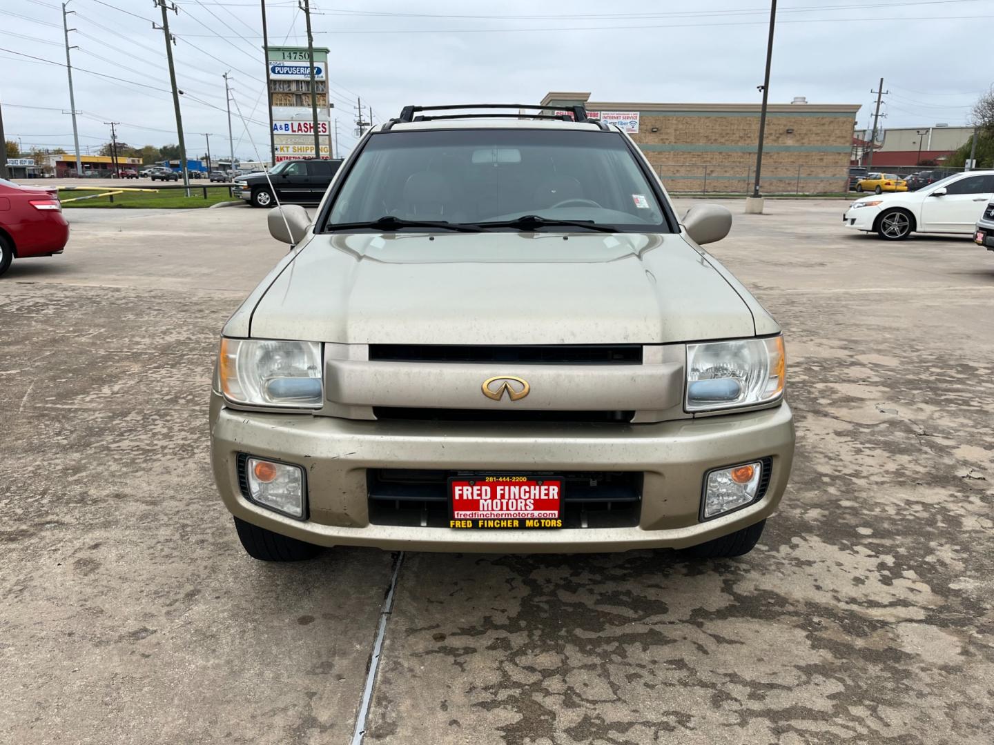 2003 tan /TAN Infiniti QX4 4WD (JNRDR09Y53W) with an 5 engine, 4-Speed Automatic Overdrive transmission, located at 14700 Tomball Parkway 249, Houston, TX, 77086, (281) 444-2200, 29.928619, -95.504074 - Photo#1